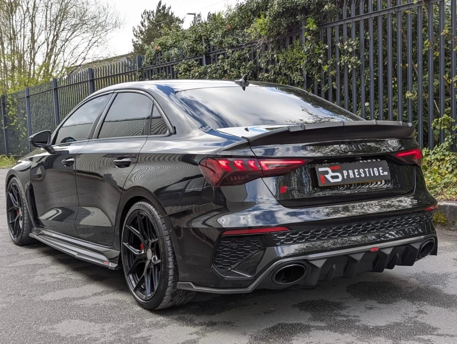 Audi RS3 8Y rear 3/4 view - Urban Automotive carbon diffuser and spoiler